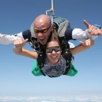 Tandem skydivers having a great time