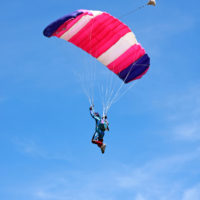 Skydiver enjoying the view from his parachute ride