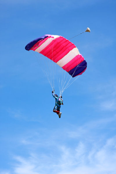 Skydiver enjoying the view from his parachute ride