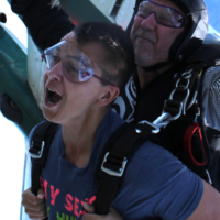 Tandem skydivers seconds after jumping from the plane