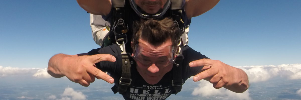 Tandem skydiving student during free fall