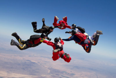 Skydivers making a formation in the sky