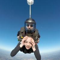 Tandem skydiving student looking worried