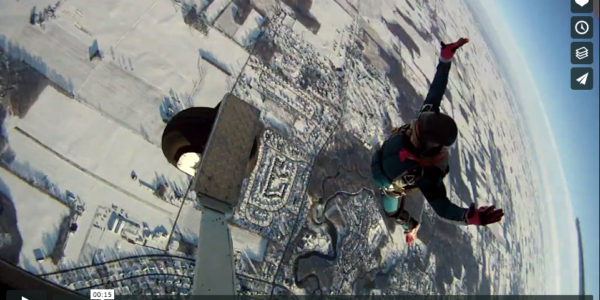 Skydiver leaps from a plane on New Years Day with Skydive Tecumseh