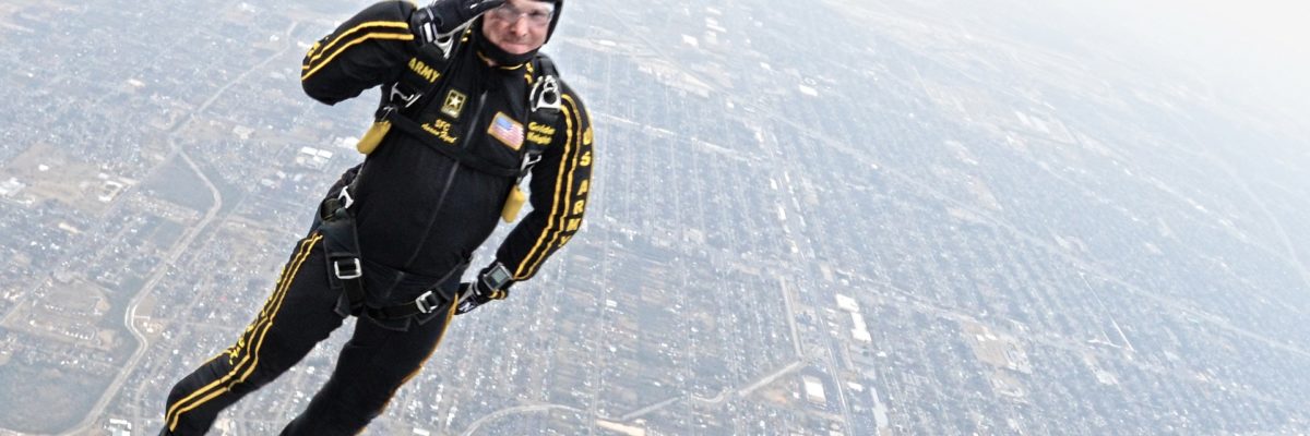 Solo skydivers giving two thumbs up