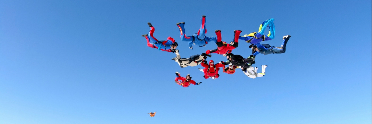 Skydivers making a formation in the sky